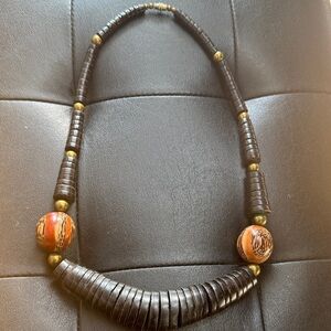 1970’s Tribal necklace featuring black heishi beads and large round beads.